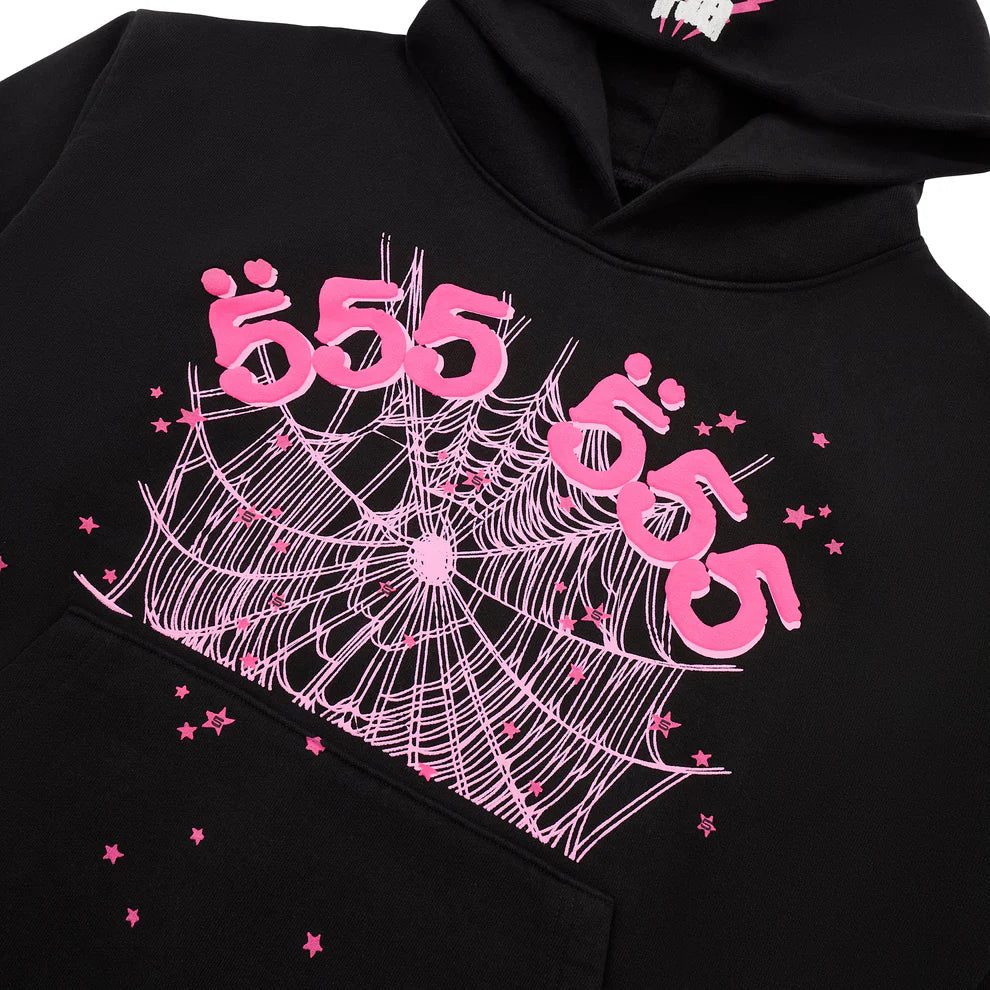 The Sp5der 555 Hoodie – Black & Pink Web 440GSM Heavyweight Pullover features vivid pink 555 text, a spider web, and stars on the front—a striking Y2K-inspired addition to any luxury streetwear collection.