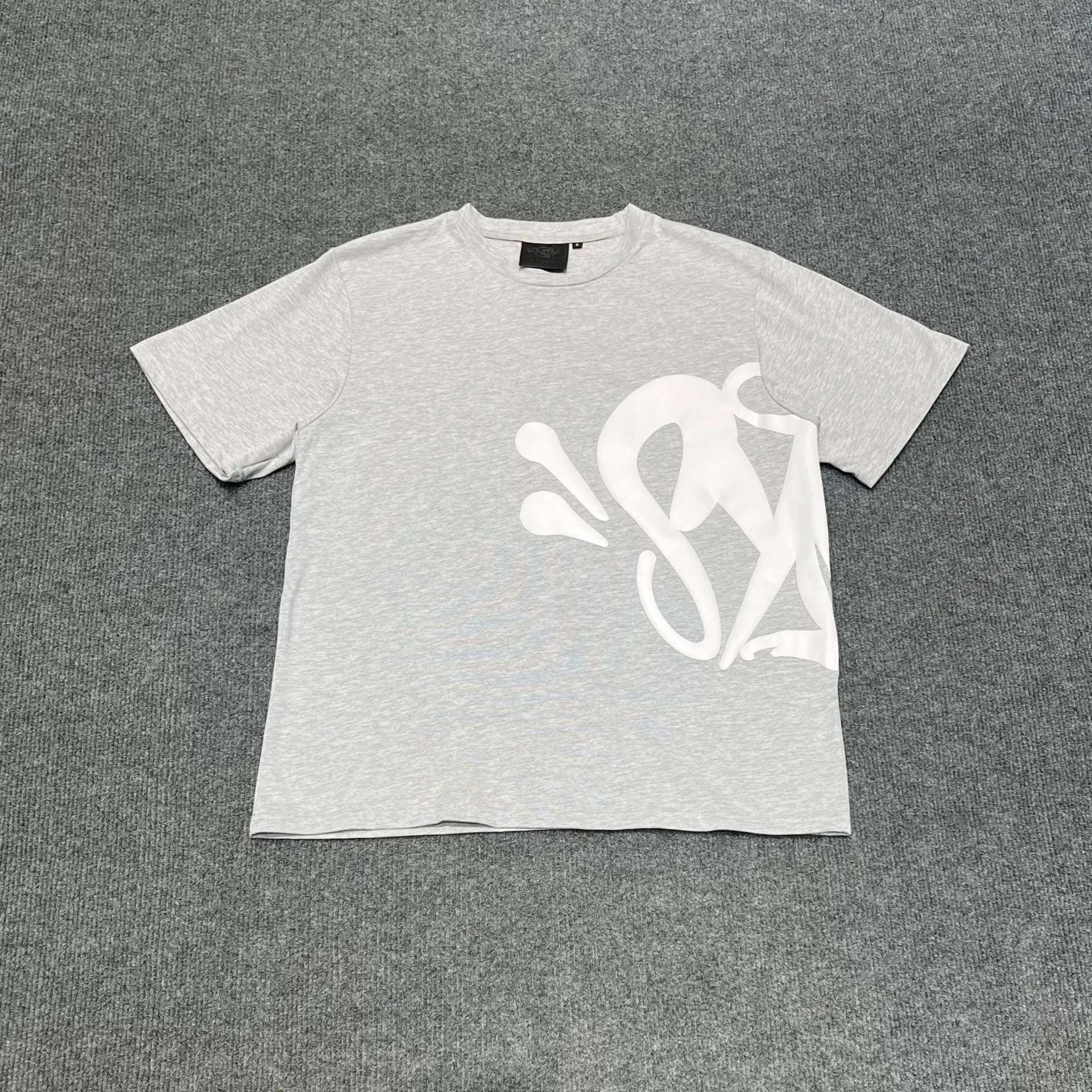 Light grey oversized crew neck T-shirt with large white script letter front graphic print