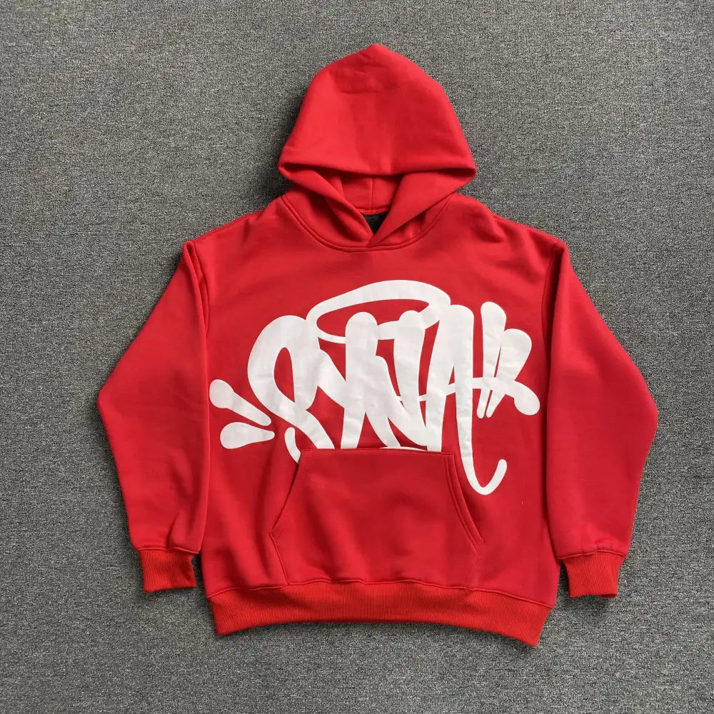 Red oversized pullover hoodie with large white graffiti letter print on the front