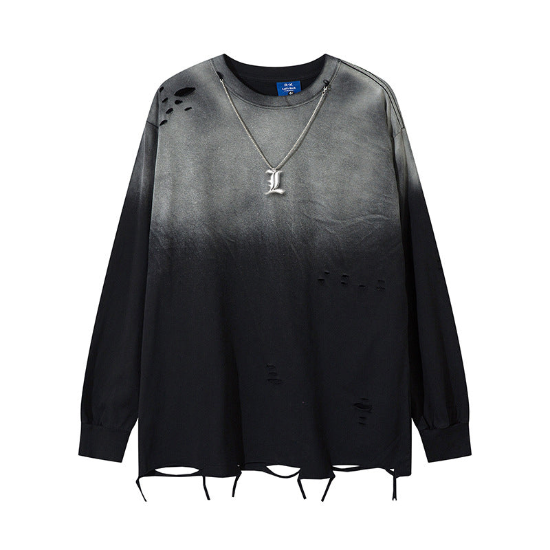 The Death Note Limited Edition Black &amp; Gray Gradient Long Sleeve Shirt features a distressed design and artistic hem, inspired by anime streetwear. Perfectly paired with a silver necklace featuring a metallic &quot;L,&quot; it echoes the iconic Death Note style.