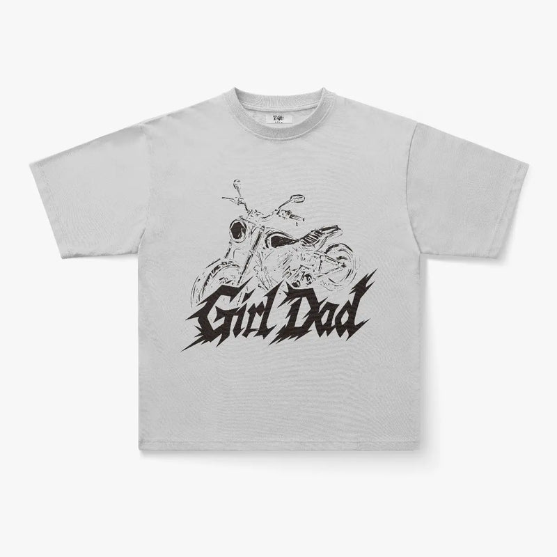 The Girl Dad Moto Graphic Oversized T-Shirt in Light Grey features a black motorcycle line drawing above bold "Girl Dad" text on the front—a must-have streetwear tee for biker dads.