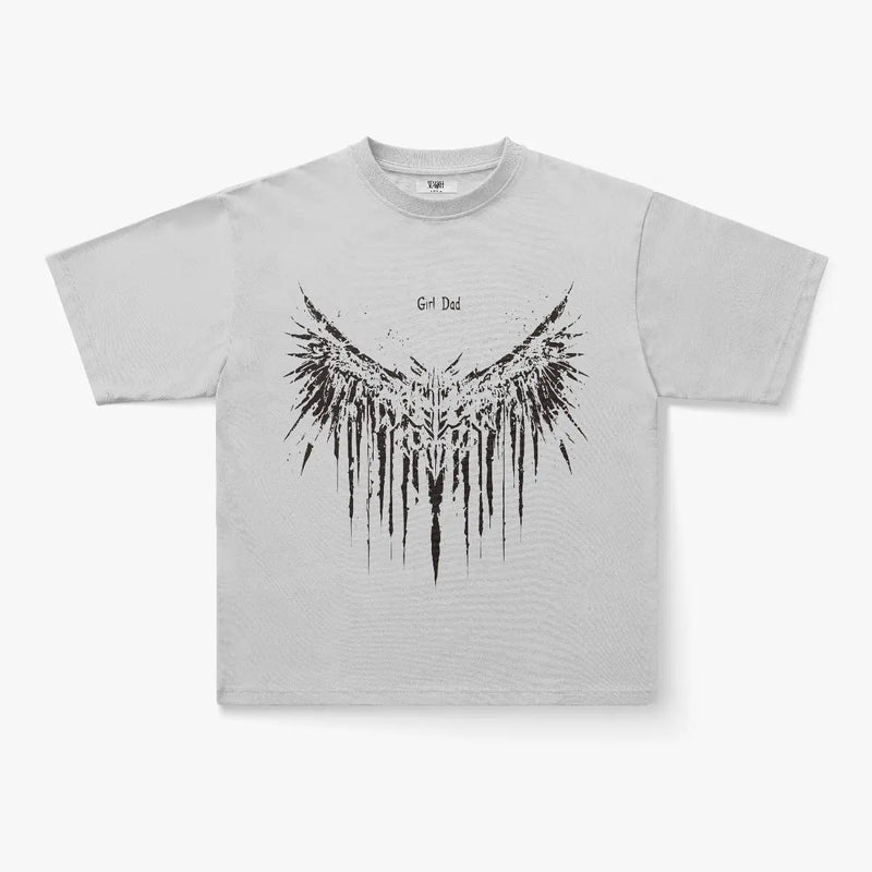 The Girl Dad Dark Angel Wings Oversized Graphic T-Shirt features a bold black abstract wing design on gray, blending gothic streetwear vibes. Shown on a plain white backdrop—ideal for fans of the dark angel wings trend.