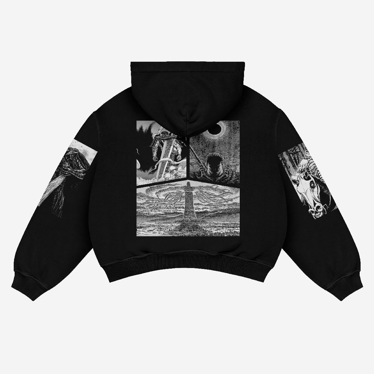 The back of the Berserk Manga Panel Hoodie – Black Oversized Streetwear features artistic designs centered around a tower with swirling patterns. The sleeves showcase black and white illustrations, including manga panels with a horse and skull, reminiscent of dark fantasy aesthetics.